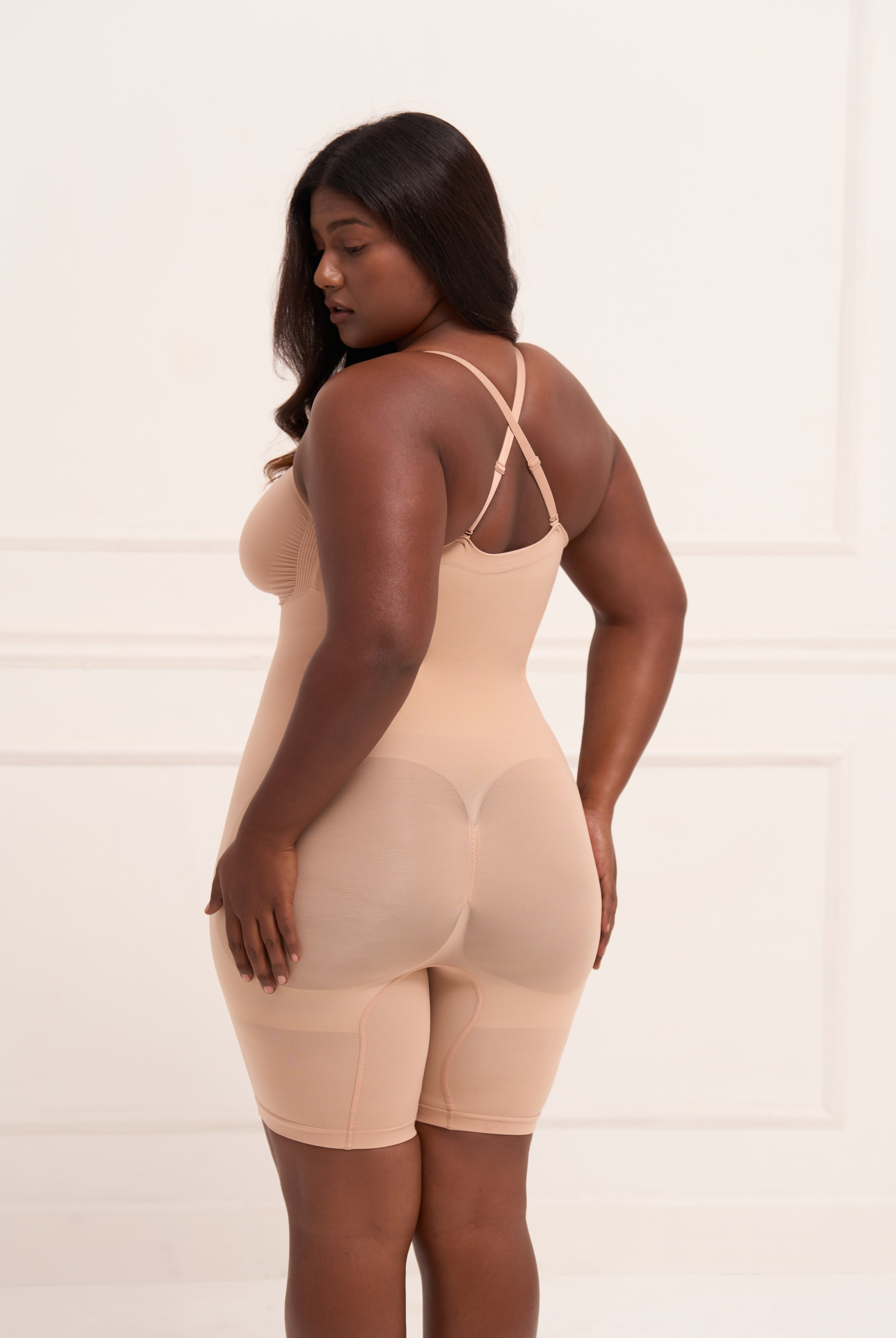 Strapless Butt Lifting Bodysuit back view – seamless beige shapewear