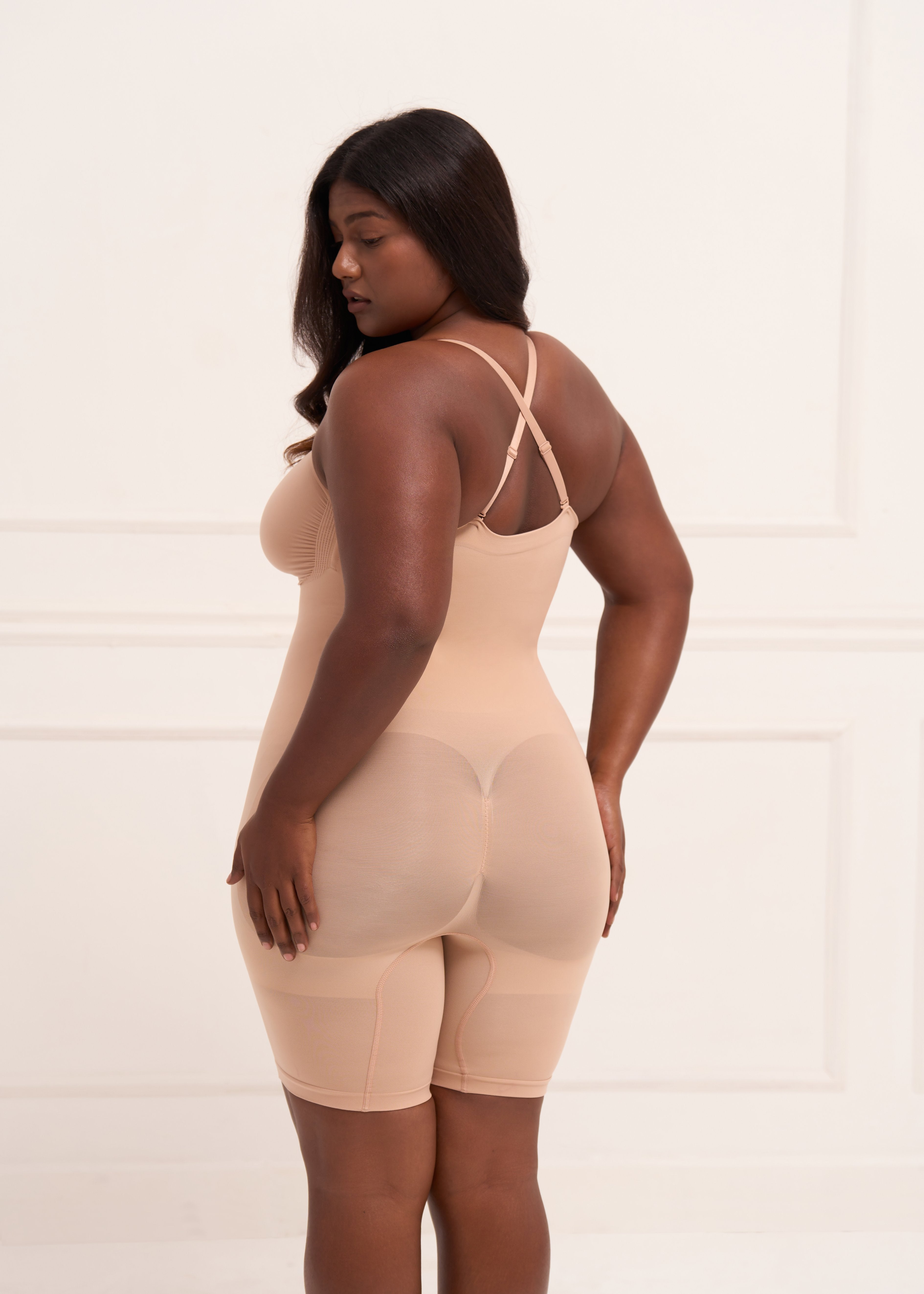 Strapless Butt Lifting Bodysuit back view – seamless beige shapewear